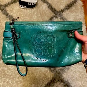 Cute green learher clutch from Coach!